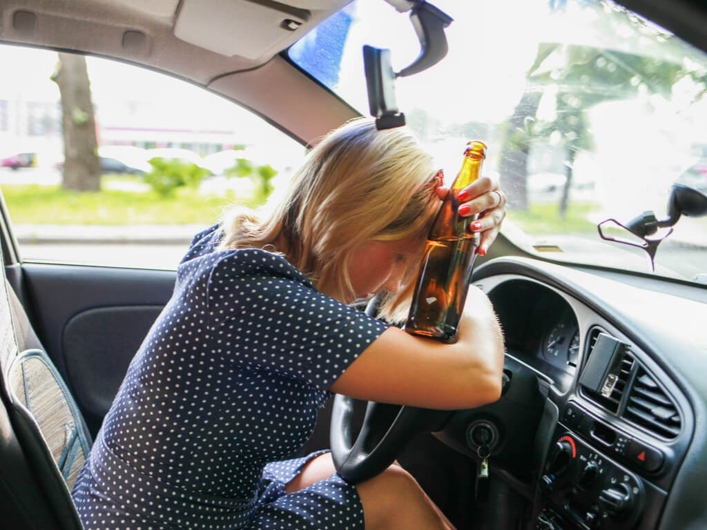 young woman drunk driving on Memorial Day